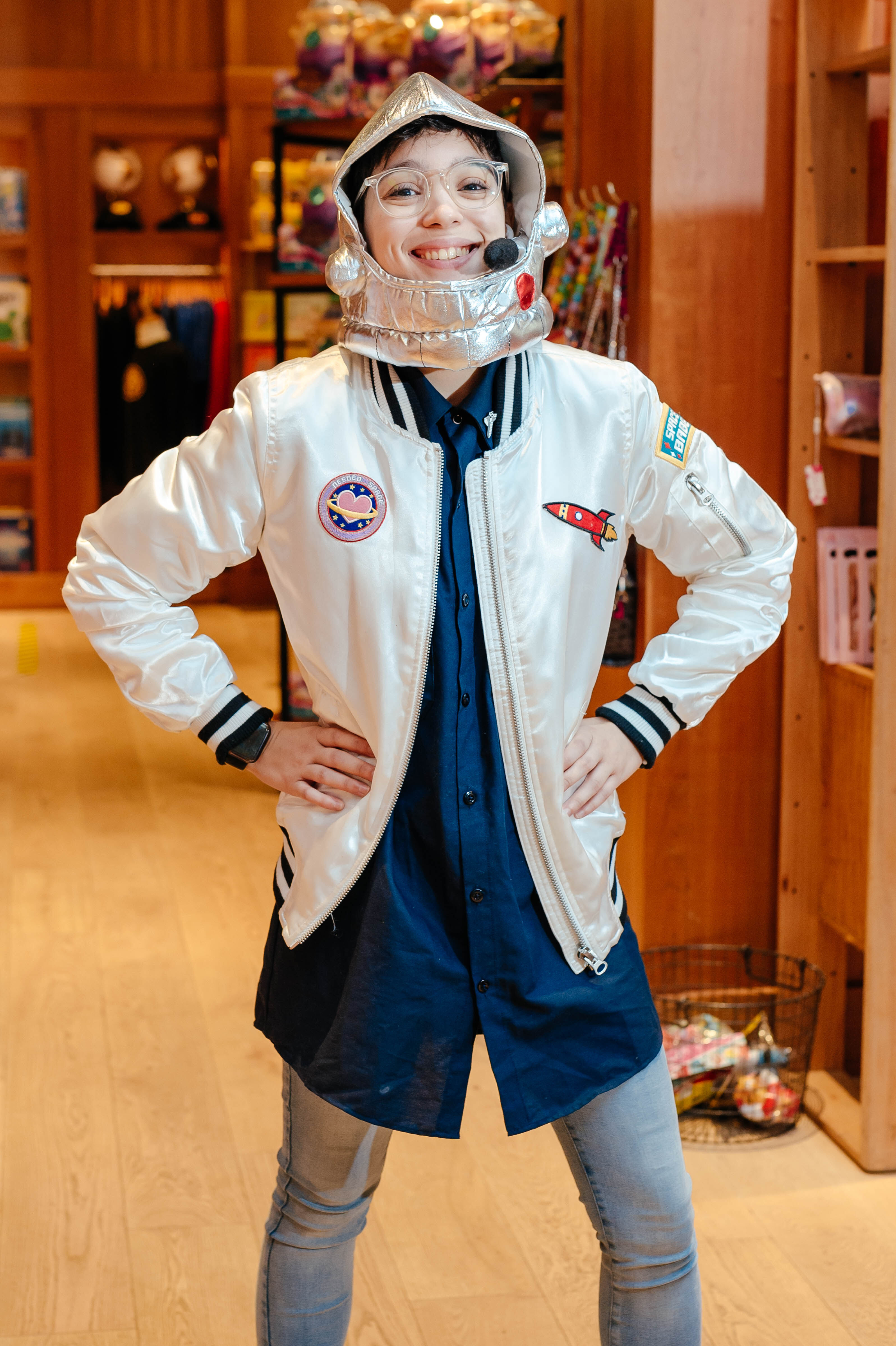 Staff member in astronaut outfit